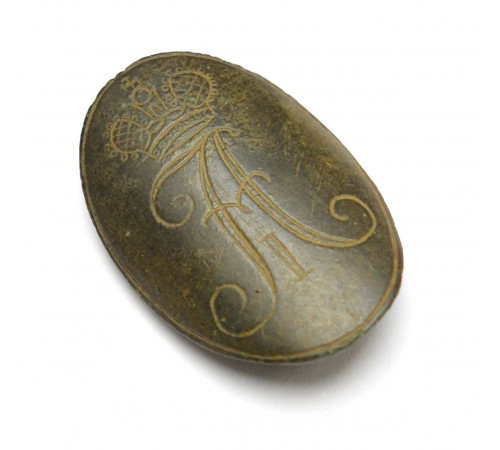 variant of a decorative shield that was attached to pistol bearning the monogramm of  Emperor Alexander I of Russia